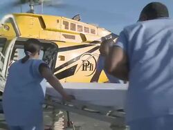 Nurses taking patient from helicopter to the hospital  Stock Footage