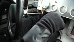 Stock-car driver shifts gears Stock Footage