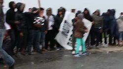 Demonstrators outside the Calais 'Jungle' Camp. Stock Footage