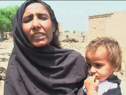 Residents flee flood-destroyed village of Waroki; US aid distributed News Clip