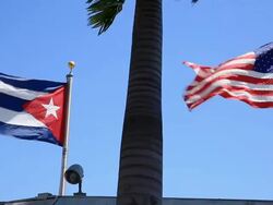 US and Cuban Flags Stock Footage