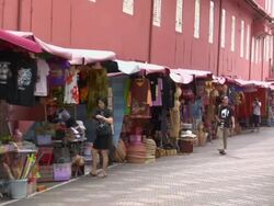 ZO Outdoor shops along pedestrian walkway / Malacca, Malaysia Stock Footage