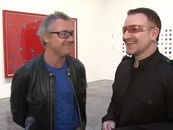 Bono and Damien Hirst Paint the Town Red For Aids In Africa - The (RED) Auction Stock Footage