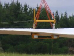 MS PAN Shot of Blade being carrying by crane / Macarthur, Victoria, Australia Stock Footage