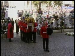 September 6, 1997 FILM MONTAGE HA WS Funeral procession for Princess Diana/ WS Carriage and guards in front Westminster Abbey/ WS Princes Philip, William, Edward, Harry, and Charles walk behind guards/ MS Church/ London, England/ AUDIO Stock Footage