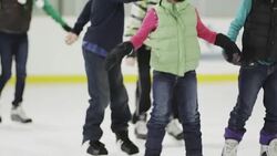 Enjoying a Day at the Ice Skating Rink Stock Footage