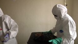 Newborn baby on an Ebola ward in Kono News Clip
