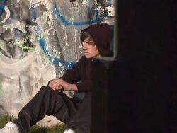 Youth / Hoody sitting around Stock Footage