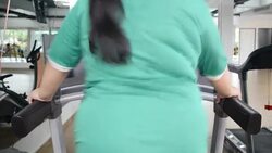 OverweightWomanRunning Stock Footage