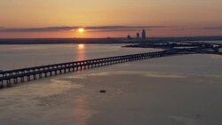 Mobile Bay, Alabama at sunset with view of highways and skyscrapers. Stock Footage
