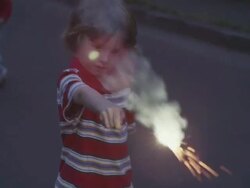 MS TS Shot of Young boy plays with sparkler / Beaverton, Oregon, United States  Stock Footage