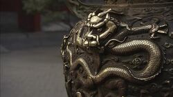 A dragon decorates a carved urn. Stock Footage