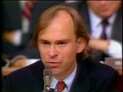 July, 1987 close up of House counsel John Nields questioning Oliver North during Iran-Contra hearings Stock Footage