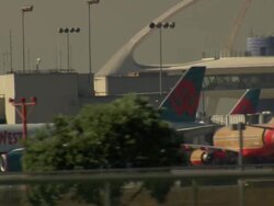 Los Angeles International Airport, TS MS airplanes, Encounter Restaurant, Tower and SouthWest airplanes / California, United States Stock Footage