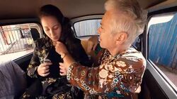 Image Sequence. OUTSIDER IN.Couple Dress Up In Small Car. Stock Footage