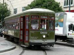 New Orleans St. Charles street car on Canal Street Stock Footage