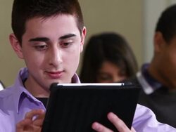 High School students using tablet PC in a classroom. Stock Footage