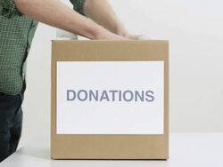 Time lapse of people putting food in donations box Stock Footage