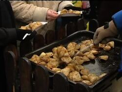 Restaurateur prepares meals for the homeless at Christmas News Clip