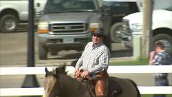 Riders and horses with Western cowboy hats News Clip