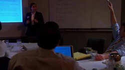 MS, PAN, Woman giving presentation in conference room Stock Footage