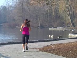 Liliana Runs Past 2 Stock Footage