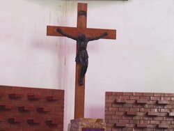 MS Shot of wooden cross with Jesus Christ in Catholic Church / Juba, Central Equatoria, Sudan  Stock Footage