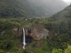 Cascada Manto de la Novia, waterfall on a basalt cliff in the Rio Pastaza gorge near Banos, Ecuador. Stock Footage