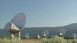 Satellite dishes operate in a grassy field for the U.S. Geological Survey in Bozeman, Montana. Stock Footage