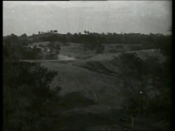 B/W wide shot PAN of countryside (Civil War battlefield) / Vicksburg, Mississippi / NO SOUND Stock Footage