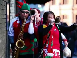 Rugby Fans Arrive At The Millennium Stadium In Cardiff Stock Footage
