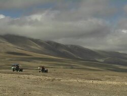 Pan Right Driving through mountainous stretch Stock Footage