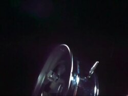 SLOMO CU hand hitting alarm clock as it goes off and knocking it over Stock Footage