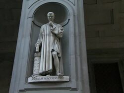 MS PAN Shot of Statue of niccolo macchiavelli at palazzo uffizi in Florence / Firenze, Tuscany, Italy Stock Footage