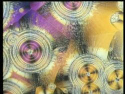 Rotate and zoom in to crystals, concentric circle pattern Stock Footage