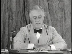 President Franklin D. Roosevelt sits at a desk and makes a speech about Social Security. News Clip