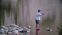 4k Slow Motion Fly Fishing inï¿½Mountain Lake at Sunrise Stock Footage