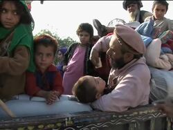 Pakistani jets hit suspected militant hide-outs as civilians flee News Clip