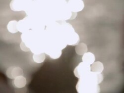 WS DEFOCUSED Light shimmering in water / India Stock Footage