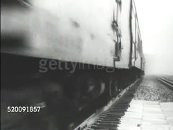 1934: EARLY DUST BOWL: *LA Angled WS Locomotive train moving down & out of frame, MS President Franklin D. Roosevelt sitting in unidentified location (very grainy), PAN Barren farmland. Crop failure, drought, topsoil erosion. Instructional Video