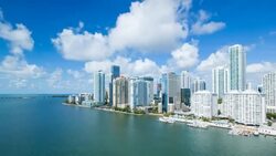 View from Brickell Key, a small island covered in apartment towers, towards the Miami skyline, Miami, Florida, USA - Time lapse Stock Footage