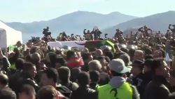 CLEAN : Crowds flood Algeria independence figures hometown for burial News Clip
