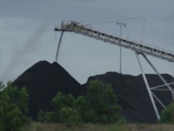 Pull focus between nature and coal extraction Stock Footage