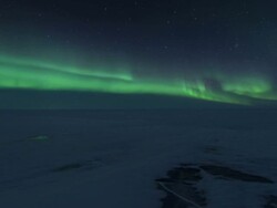 T/L of aurora over Salt River at Wood Buffalo National Park with slow dolly push in Stock Footage