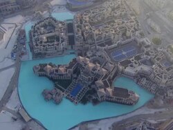  WS AERIAL View of Swimming pool in houses like dolls house and building site under construction / Dubai, United Arab Emirates Stock Footage