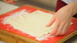 rolling dough with a rolling pin Stock Footage