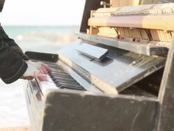 pianist and an old piano Stock Footage