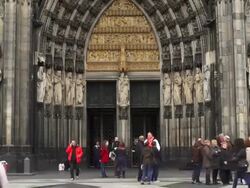T/L Tourists Rushing in Front of the Entrance of Cologne Cathedral (Koelner Dom) Stock Footage