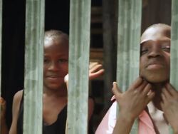 MS Shot of children waving hands and smiling / Freetown, Sierra Leone Stock Footage