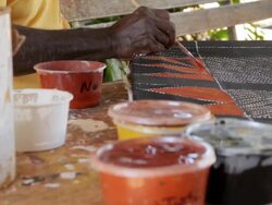 CU Shot of brush as man painting tiwi art / Northern Territory, Australia Stock Footage